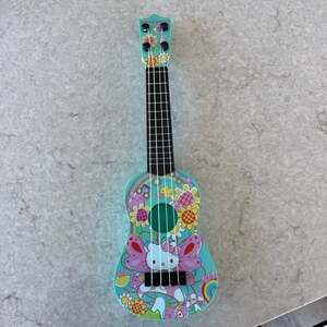 Hello Kitty First Act Teal Floral Flower Power Ukulele Musical Toy
